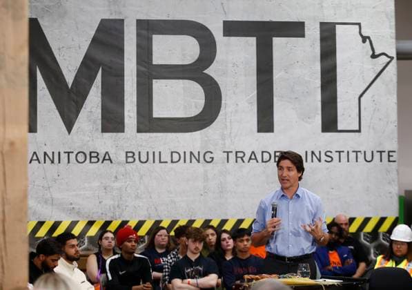 April 12, 2023, WINNIPEG, MANITOBA, CANADA: Prime Minister Justin Trudeau speaks during a town hall meeting at the Manitoba Building Trades Institute in Winnipeg, Wednesday, April 12, 2023. WINNIPEG CANADA  - ZUMAc35_ 20230412_zaf_c35_092 Copyright: xJohnxWoodsx