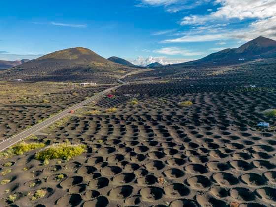 Aerial view of wine growing district of La Geria, Timanfaya National Park, Lanzarote, Canary Islands, Spain, Atlantic, Europe Copyright: FrankxFell 844-28569