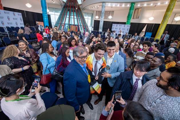 April 13, 2023, Regina, SK, Canada: Prime Minister Justin Trudeau is gifted a star blanket from George Gordon First Nation Chief Byron Bitternose, left, Josh Montana and others at a town hall at the First Nations University of Canada in Regina, Thursday, April 13, 2023. Regina Canada  - ZUMAc35_ 20230413_zaf_c35_161 Copyright: xLiamxRichardsx