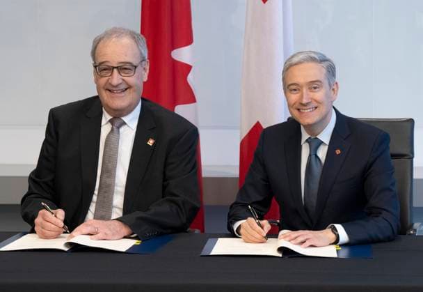 April 14, 2023, Montreal, PQ, Canada: Switzerland Federal Councillor Guy Parmelin, left, and Federal Innovation Minister Francois-Philippe Champagne sign a renewal of their agreement on science, technology and innovation cooperation between the two countries Friday, April 14, 2023 in Montreal. Montreal Canada  - ZUMAc35_ 20230414_zaf_c35_024 Copyright: xRyanxRemiorzx