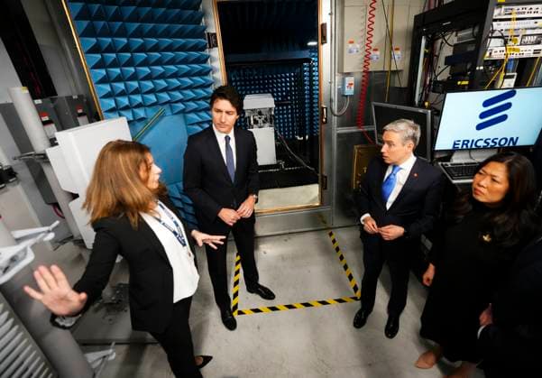 April 17, 2023, Ottawa, ON, CAN: Prime Minister Justin Trudeau and Minister of Innovation, Science and Industry Francois-Philippe Champagne, second from right, and Minister of International Trade, Export Promotion, Small Business and Economic Development Mary Ng, right, are given a tour of a lab at Ericsson prior to holding an announcement and press conference in Ottawa on Monday, April 17, 2023. Ottawa CAN  - ZUMAc35_ 20230417_zaf_c35_014 Copyright: xSeanxKilpatrickx