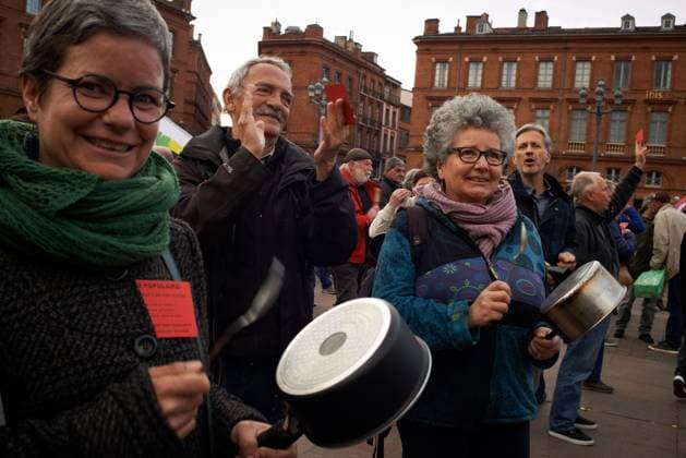 Pot Concert During Macron s Speech On Tvs And Radios A few thousands people gathered in front of the Capitole in Toulouse for a pot concert at the same French President Macron spoke on TVs and radios. They are angered by the decision to validate the pension bill by the consitutional council and its promulgation by Macron soon after. The pension bill will delay retirement by two years to 64 and was pushed through parliament by the government without a vote.Polls show 64% french people say they want the stirkes to intensify and that 93% of workers oppose the pension reform. The retirement age would be raised to 64 years (for 43 years of continued work) and the pensions will be lower specially for women, short careers and low wages people. T  Copyright: xAlainxPittonx originalFilename: pitton-notitle230417_npHsP.jpg