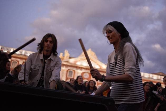 Pot Concert During Macron s Speech On Tvs And Radios People play drums on a trash bin during the pot concert in toulouse. A few thousands people gathered in front of the Capitole in Toulouse for a pot concert at the same French President Macron spoke on TVs and radios. They are angered by the decision to validate the pension bill by the consitutional council and its promulgation by Macron soon after. The pension bill will delay retirement by two years to 64 and was pushed through parliament by the government without a vote.Polls show 64% french people say they want the stirkes to intensify and that 93% of workers oppose the pension reform. The retirement age would be raised to 64 years (for 43 years of continued work) and the pensions will  Copyright: xAlainxPittonx originalFilename: pitton-notitle230417_npYPy.jpg