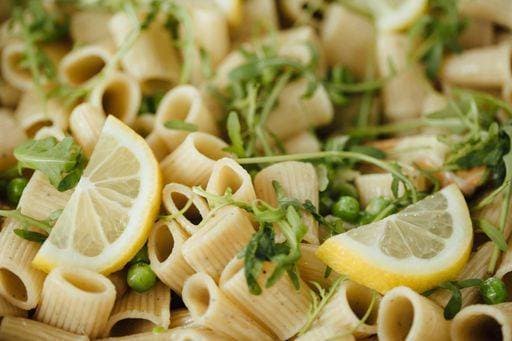 RECORD DATE NOT STATED A close-up shot of rigatoni pasta with lemons and greens served on a plate. *** einer schließen Aufwärts erschossen des rigatoni Teigwaren mit Zitronen und Grünen angerichtet am einer Teller 1997150