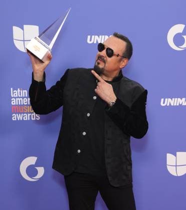 Pepe Aguilar, winner of the Legacy award, poses backstage during the 8th annual Latin American Music Awards at the MGM Grand Garden Arena in Las Vegas on Thursday, April 20, 2023. The annual event honors outstanding achievements for artists in the Latin music industry.  LAV2023042122 JAMESxATOA