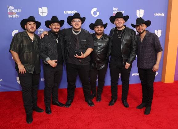 Groupa Frontera, winners of the Favorite Regional Mexican Song award for No se va (En vivo), pose in the press room during the 8th annual Latin American Music Awards at the MGM Grand Garden Arena in Las Vegas on Thursday, April 20, 2023. The annual event honors outstanding achievements for artists in the Latin music industry.  LAV2023042143 JAMESxATOA