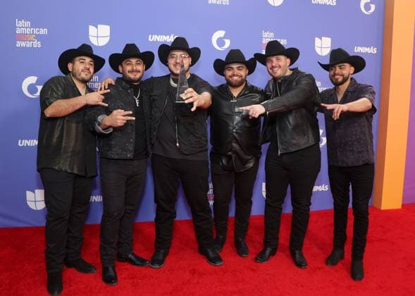Groupa Frontera, winners of the Favorite Regional Mexican Song award for No se va (En vivo), pose in the press room during the 8th annual Latin American Music Awards at the MGM Grand Garden Arena in Las Vegas on Thursday, April 20, 2023. The annual event honors outstanding achievements for artists in the Latin music industry.  LAV2023042144 JAMESxATOA
