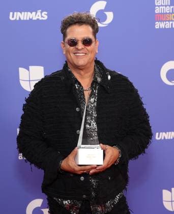 Carlos Vives, winner of the Legacy award, poses in the press room during the 8th annual Latin American Music Awards at the MGM Grand Garden Arena in Las Vegas on Thursday, April 20, 2023. The annual event honors outstanding achievements for artists in the Latin music industry.  LAV2023042145 JAMESxATOA