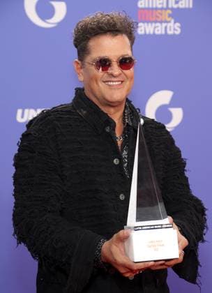Carlos Vives, winner of the Legacy award, poses in the press room during the 8th annual Latin American Music Awards at the MGM Grand Garden Arena in Las Vegas on Thursday, April 20, 2023. The annual event honors outstanding achievements for artists in the Latin music industry.  LAV2023042146 JAMESxATOA