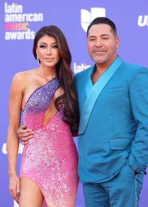 (L-R) Holly Sonders and Oscar De La Hoya attend the 8th annual Latin American Music Awards at the MGM Grand Garden Arena in Las Vegas on Thursday, April 20, 2023. The annual event honors outstanding achievements for artists in the Latin music industry.  LAV2023042266 JAMESxATOA