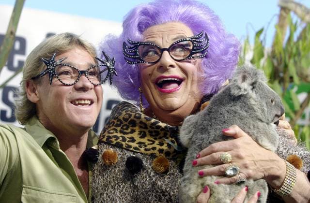 BARRY HUMPHRIES OBIT, *FILE* Barry Humphries as his alter egos Dame Edna (right) poses for a photograph with Steve Irwin at Australia Zoo, north of Brisbane, June 13, 2003. Entertainer Barry Humphries, who brought to life Dame Edna Everage and Sir Les Patterson, has died at the age of 89 in a Sydney hospital surrounded by family. ( NO ARCHIVING, EDITORIAL USE ONLY, NO USE IN BOOKS WITHOUT CONSENT BRISBANE QLD AUSTRALIA  Copyright: xDAVExHUNTx 20230422001789503078