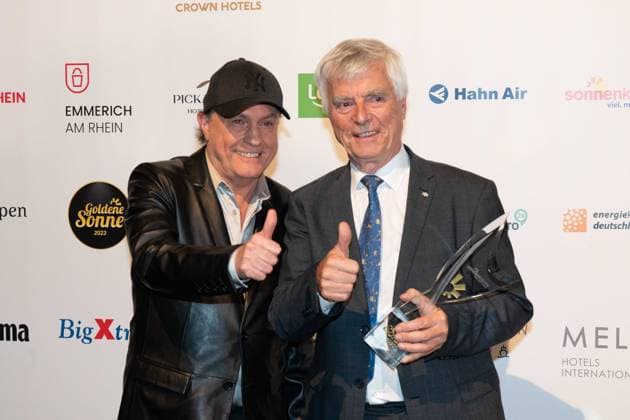 Ulf MERBOLD, astronaut, receives the honorary award for his lifes work in science and research, with laudator Peter SCHILLING, left, singer, The Golden Sun 2023, on 22 04 2023 in Wunderland Kalkar,