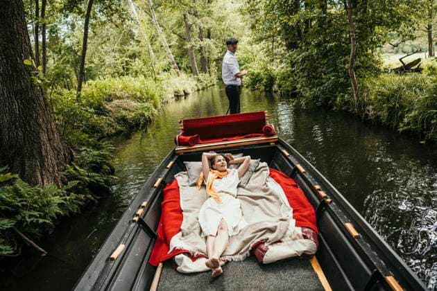 Woman spending vacation lying on boat in canal model released, Symbolfoto property released, MJRF00940