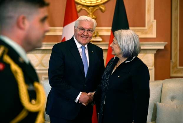 April 23, 2023, Ottawa, ON, CAN: An Aide-de-Camp steps out of the way as Governor General of Canada Mary Simon, right, greets Frank-Walter Steinmeier, President of the Federal Republic of Germany, at Rideau Hall in Ottawa on Sunday, April 23, 2023. Ottawa CAN - ZUMAc35_ 20230423_zaf_c35_003 Copyright: xJustinxTangx