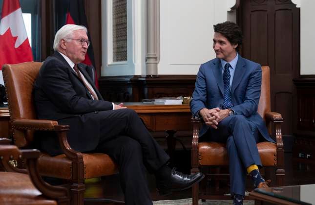 April 24, 2023, Ottawa, ON, Canada: Prime Minister Justin Trudeau speaks with German President Frank-Walter Steinmeier in his office on Parliament Hill, Monday, April 24, 2023 in Ottawa. Ottawa Canada  - ZUMAc35_ 20230424_zaf_c35_020 Copyright: xAdrianxWyldx