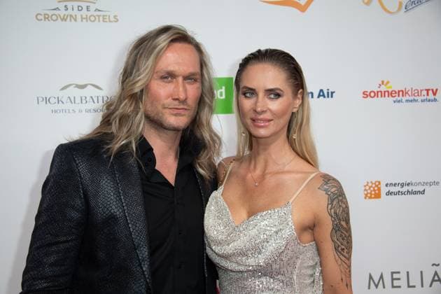 Nico SCHWANZ, model, with companion Evelina, red carpet, red carpet show, arrival, arrival, The Golden Sun 2023, on 22 04 2023 in Wunderland Kalkar,