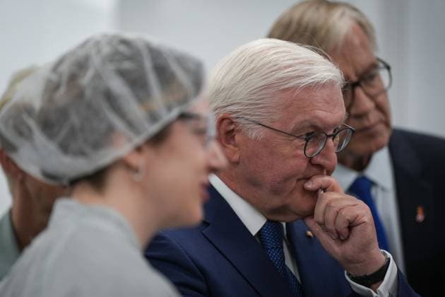 April 25, 2023, BURNABY, BC, CANADA: Germany President Frank-Walter Steinmeier listens during a tour of fuel cell stack manufacturer, Cellcentric Canada, in Burnaby, B.C., Tuesday, April 25, 2023. BURNABY CANADA  - ZUMAc35_ 20230425_zaf_c35_058 Copyright: xDarrylxDyckx