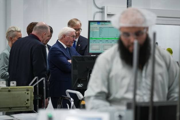 April 25, 2023, BURNABY, BC, CANADA: Germany President Frank-Walter Steinmeier, back right, listens during a tour of fuel cell stack manufacturer, Cellcentric Canada, in Burnaby, B.C., Tuesday, April 25, 2023. BURNABY CANADA  - ZUMAc35_ 20230425_zaf_c35_059 Copyright: xDarrylxDyckx
