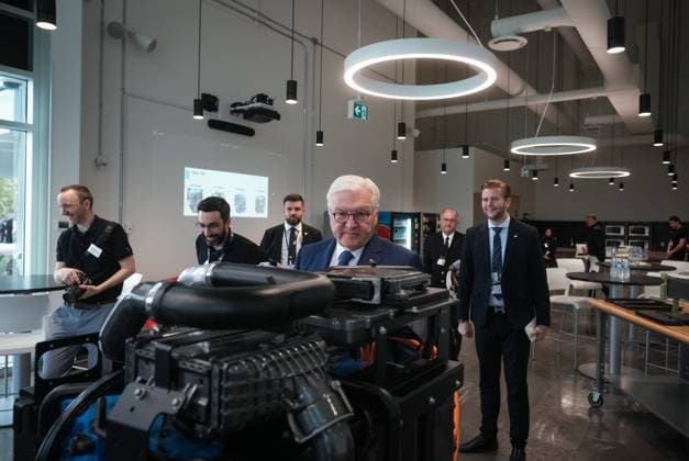 April 25, 2023, BURNABY, BC, CANADA: Germany President Frank-Walter Steinmeier, front centre, views a fuel cell system prototype during a tour of fuel cell stack manufacturer, Cellcentric Canada, in Burnaby, B.C., Tuesday, April 25, 2023. BURNABY CANADA  - ZUMAc35_ 20230425_zaf_c35_060 Copyright: xDarrylxDyckx