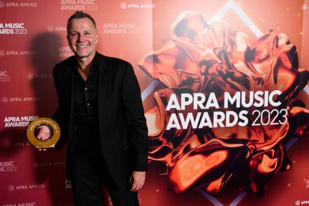 2023 APRA MUSIC AWARDS, Head of Music for Triple M Mickey Maher holds 2023 Licensee of the Year Award at the 2023 APRA Music Awards at the International Convention Centre, in Sydney, Thursday, April 27, 2023. ( NO ARCHIVING, EDITORIAL USE ONLY, NO USE IN BOOKS WITHOUT CONSENT SYDNEY NSW AUSTRALIA  Copyright: xJAMESxGOURLEYx 20230427001791467052