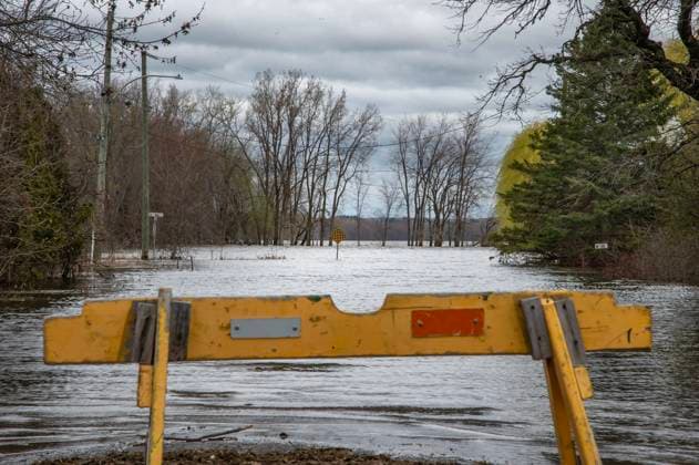 April 30, 2023, Rigaud, PQ, CANADA: Homes and roads are threatened by high water levels along the Ottawa river in the town of Rigaud, Que., Just west of the island of Montreal, Sunday, April 30, 2023. The area is on high alert with a total of 30 to 50 millimetres of rain expected from Sunday evening into Monday. Rigaud CANADA  - ZUMAc35_ 20230430_zaf_c35_023 Copyright: xPeterxMccabex