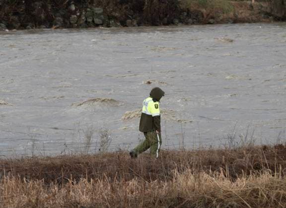 May 1, 2023, BAIE SAINT-PAUL, PQ, CANADA: A police officer searches the river banks looking for missing people on Monday, May 1, 2023 in Baie-Saint-Paul, Quebec. Provincial police searched on Monday for two people swept away by the current on the flooded RivioÂ¨re du Gouffre, in Quebec s Charlevoix region, where up to 60 millimetres of rain fell within a 24-hour period. BAIE SAINT-PAUL CANADA  - ZUMAc35_ 20230501_zaf_c35_090 Copyright: xJacquesxBoissinotx