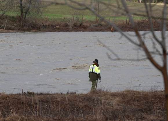 May 1, 2023, BAIE SAINT-PAUL, PQ, CANADA: A police officer searches the river banks looking for missing people on Monday, May 1, 2023 in Baie-Saint-Paul, Quebec. Provincial police searched on Monday for two people swept away by the current on the flooded RivioÂ¨re du Gouffre, in Quebec s Charlevoix region, where up to 60 millimetres of rain fell within a 24-hour period. BAIE SAINT-PAUL CANADA  - ZUMAc35_ 20230501_zaf_c35_091 Copyright: xJacquesxBoissinotx