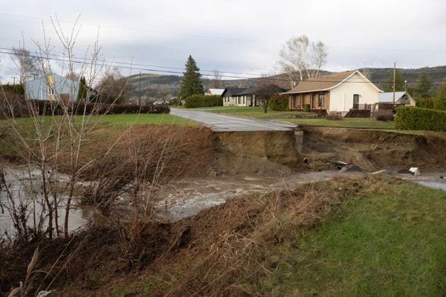 May 1, 2023, BAIE SAINT-PAUL, PQ, CANADA: A neighborhood is cut off from the city as a flooded river took out the bridge on Monday, May 1, 2023 in Baie-Saint-Paul, Quebec. In Baie-St-Paul, Que., around 90 kilometres northeast of the provincial capital, the mayor declared a state of emergency due to heavy rains that washed away roads and isolated homes. BAIE SAINT-PAUL CANADA - ZUMAc35_ 20230501_zaf_c35_096 Copyright: xJacquesxBoissinotx
