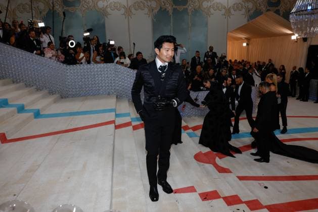 Simu Liu arrives on the red carpet for The Met Gala at The Metropolitan Museum of Art celebrating the opening of Karl Lagerfeld: A Line of Beauty in New York City on Monday, May 1, 2023.  NYP202305012497 JOHNxANGELILLO