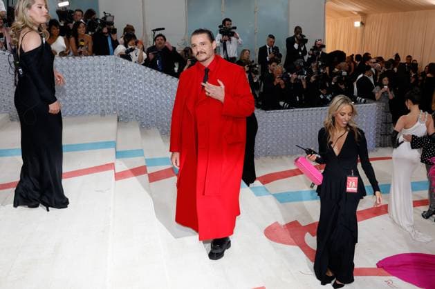 Pedro Pascal arrives on the red carpet for The Met Gala at The Metropolitan Museum of Art celebrating the opening of Karl Lagerfeld: A Line of Beauty in New York City on Monday, May 1, 2023.  NYP202305012603 JOHNxANGELILLO