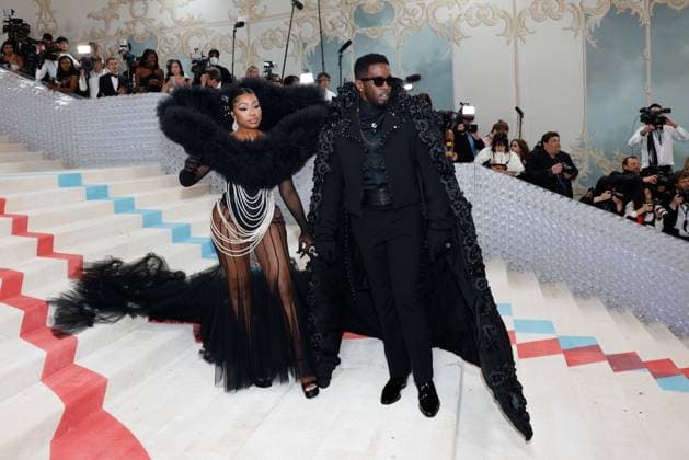 Yung Miami (L) and Sean Diddy Combs arrive on the red carpet for The Met Gala at The Metropolitan Museum of Art celebrating the opening of Karl Lagerfeld: A Line of Beauty in New York City on Monday, May 1, 2023.  NYP20230501298 JOHNxANGELILLO