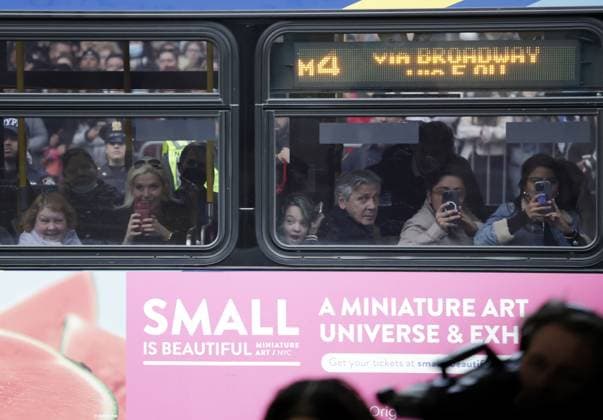 Passengers on a passing Fifth Avenue bus get a glimpse of the red carpet arrivals for The Met Gala at The Metropolitan Museum of Art celebrating the opening of Karl Lagerfeld: A Line of Beauty in New York City on Monday, May 1, 2023.  NYP202305013001 JOHNxANGELILLO