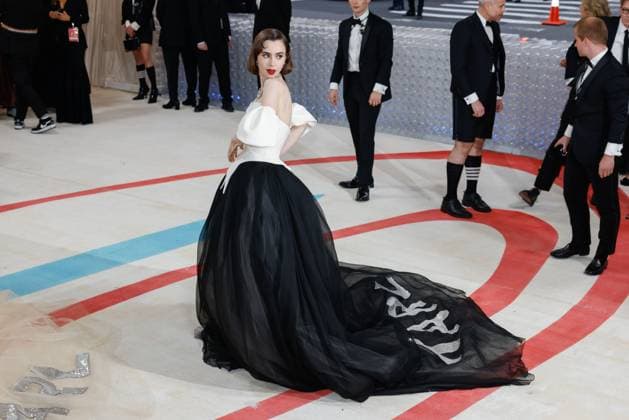 Lily Collins arrives on the red carpet for The Met Gala at The Metropolitan Museum of Art celebrating the opening of Karl Lagerfeld: A Line of Beauty in New York City on Monday, May 1, 2023.  NYP202305011664 JOHNxANGELILLO