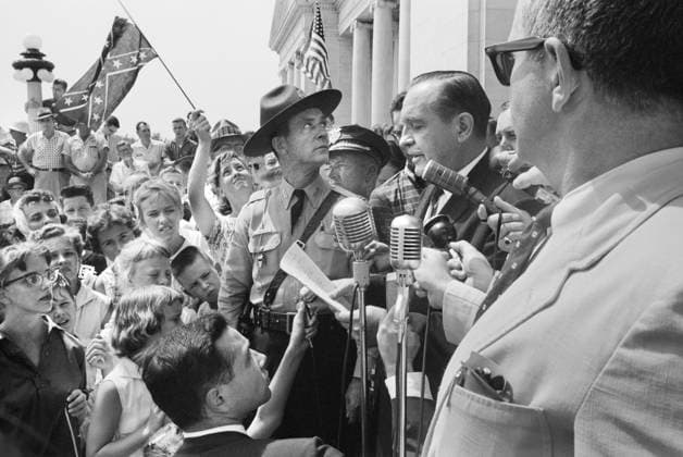 Arkansas Governor Orval Faubus speaking to Crowd, one holding Confederate flag, gathered at Arkansas State Capitol to protest Integration of Central High School, Little Rock, Arkansas, USA, John T. Bledsoe, U.S. News & World Report Magazine Photograph Collection, August 20, 1959  Copyright: xCircaxImagesx ghi-circa11611