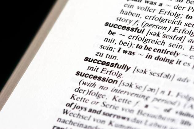 Opened Dictionary with SUCCESS - Studioshot on black background Copyright: xPeterxMautschx xDesignxPicsx , 30850390 Copyright: PeterxMautschx xDesignxPics 30850390