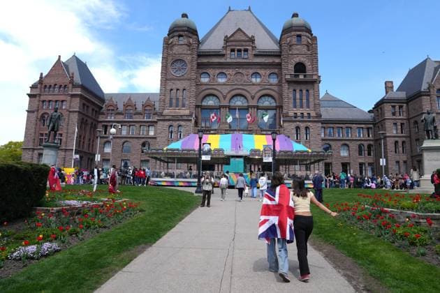 May 6, 2023, TORONTO, ON, CAN: People visit a fun fair held in the grounds of the Ontario Legislature in Toronto, to mark the Coronation of King Charles III, on Saturday May 6, 2023. TORONTO CAN  - ZUMAc35_ 20230506_zaf_c35_120 Copyright: xChrisxYoungx