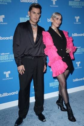 Domino Saints arrive on the red carpet at the Inaugural Latin Women in Music award show at the Watsco Center, University of Miami in Miami Florida on Saturday, May 6, 2023. The Billboard Telemundo red carpet and show will air Sunday, May 7, 2023 at 9 PM 8 CT on Telemundo and Universo.  MIA20230506118 GARYxIxROTHSTEIN