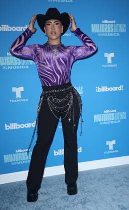 Louie Castro arrives on the red carpet at the Inaugural Latin Women in Music award show at the Watsco Center, University of Miami in Miami Florida on Saturday, May 6, 2023. The Billboard Telemundo red carpet and show will air Sunday, May 7, 2023 at 9 PM 8 CT on Telemundo and Universo.  MIA20230506163 GARYxIxROTHSTEIN
