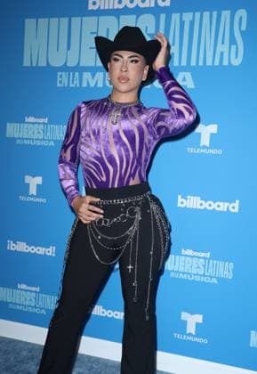 Louie Castro arrives on the red carpet at the Inaugural Latin Women in Music award show at the Watsco Center, University of Miami in Miami Florida on Saturday, May 6, 2023. The Billboard Telemundo red carpet and show will air Sunday, May 7, 2023 at 9 PM 8 CT on Telemundo and Universo.  MIA20230506164 GARYxIxROTHSTEIN