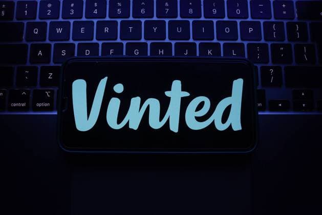 Popular Apps Photo Illustrations A laptop keyboard and Vinted logo displayed on a phone screen are seen in this illustration photo taken in Krakow, Poland on May 7, 2023. Krakow Poland  Copyright: xJakubxPorzyckix originalFilename: porzycki-populara230507_npzGH.jpg