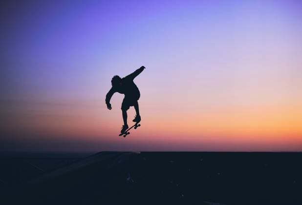 Skateboarder in action, silhouette unrecognizable. Lima, Callao Region, Peru CR_DOQO230503CE-1179360-01