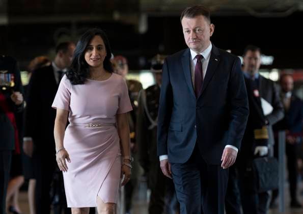 May 8, 2023, Ottawa, ON, Canada: Minister of Defence Anita Anand walks Deputy Prime Minister and Minister of National Defence of Poland, Mariusz BAöaszczak as he arrives at National Defence Headquarters, Monday, May 8, 2023 in Ottawa. Ottawa Canada  - ZUMAc35_ 20230508_zaf_c35_001 Copyright: xAdrianxWyldx