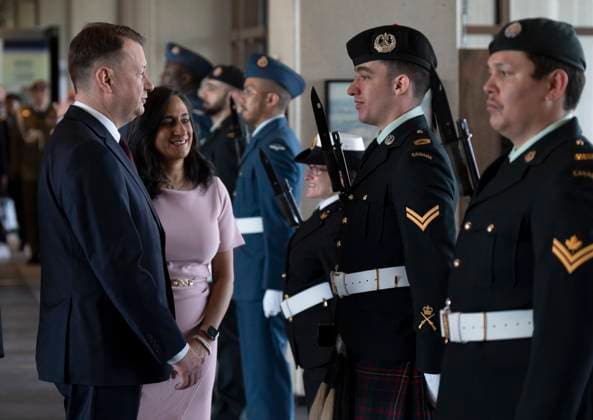 May 8, 2023, Ottawa, ON, Canada: Polish Deputy Prime Minister and Minister of National Defence of Poland Mariusz BAöaszczak speaks with a soldier as Minister of Defence Anita Anand looks on as he arrives at National Defence Headquarters, Monday, May 8, 2023 in Ottawa. Ottawa Canada  - ZUMAc35_ 20230508_zaf_c35_003 Copyright: xAdrianxWyldx
