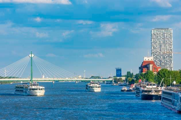 cruise ships on river Donau (Danube), Marina Tower, bridge Donaustadtbrücke Vienna Wien Austria 02. Leopoldstadt