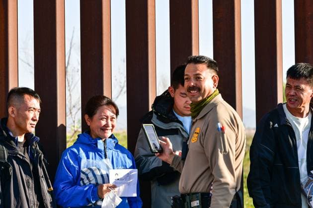 YUMA, AZ - MAY 11: Migrants seen set to cross the border at Cocopah Indian Reservation before Title 42 is set to end at 11:59pm allowing all migrants to apply for asylum after the three-year COVID-era health ban. Yuma, Arizona on May 11, 2023. Copyright: xDeeCeexCarterx