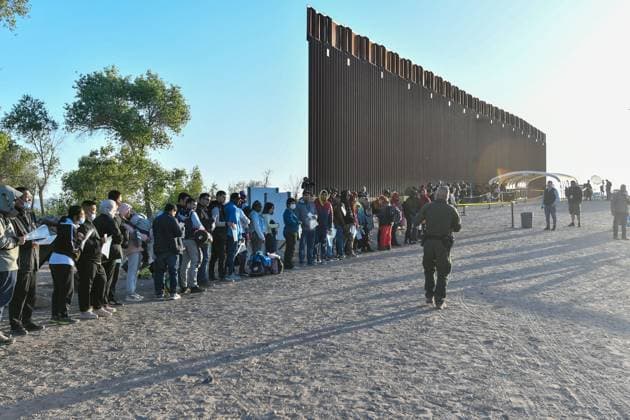 YUMA, AZ - MAY 11: Migrants seen set to cross the border at Cocopah Indian Reservation before Title 42 is set to end at 11:59pm allowing all migrants to apply for asylum after the three-year COVID-era health ban. Yuma, Arizona on May 11, 2023. Copyright: xDeeCeexCarterx