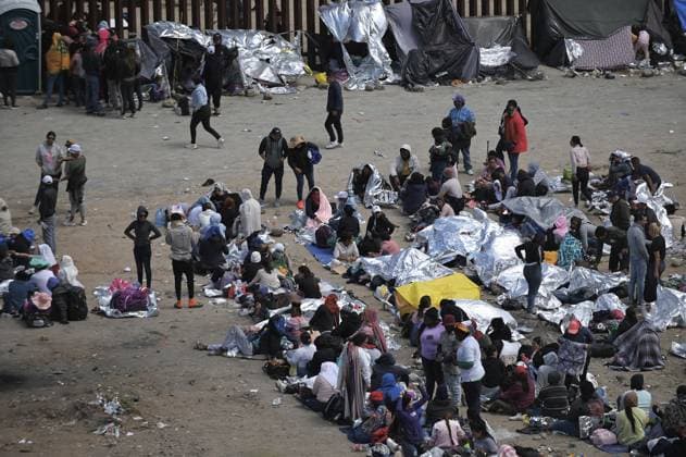 Migrants stuck between the primary and secondary fencing at the Tijuana-San Diego border for over a week, wait and hope to be allowed to immigrate to the U.S. more easily after the Title-42 deportation order expires on May 11, as seen from Tijuana, Mexico on Thursday, May 11, 2023.  TIJ2023051111 CarlosxMoreno UPI