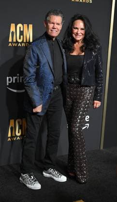 Randy Travis and Mary Davis arrives on the red carpet for the 2023 Academy of Country Music Awards at The Star in Frisco, TX on Thursday, May 11, 2023.  FRS2023051127 IANxHALPERIN