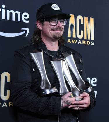 HARDY shows off his ACM awards for Artist of the Year, Music Event of the Year and Visual Media of the Year at the 2023 Academy of Country Music Awards at The Star in Frisco, TX on Thursday, May 11, 2023.  FRS2023051145 IANxHALPERIN