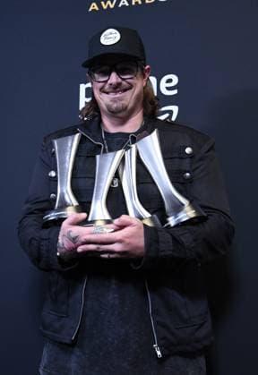 HARDY shows off his ACM awards for Artist of the Year, Music Event of the Year and Visual Media of the Year at the 2023 Academy of Country Music Awards at The Star in Frisco, TX on Thursday, May 11, 2023.  FRS2023051147 IANxHALPERIN